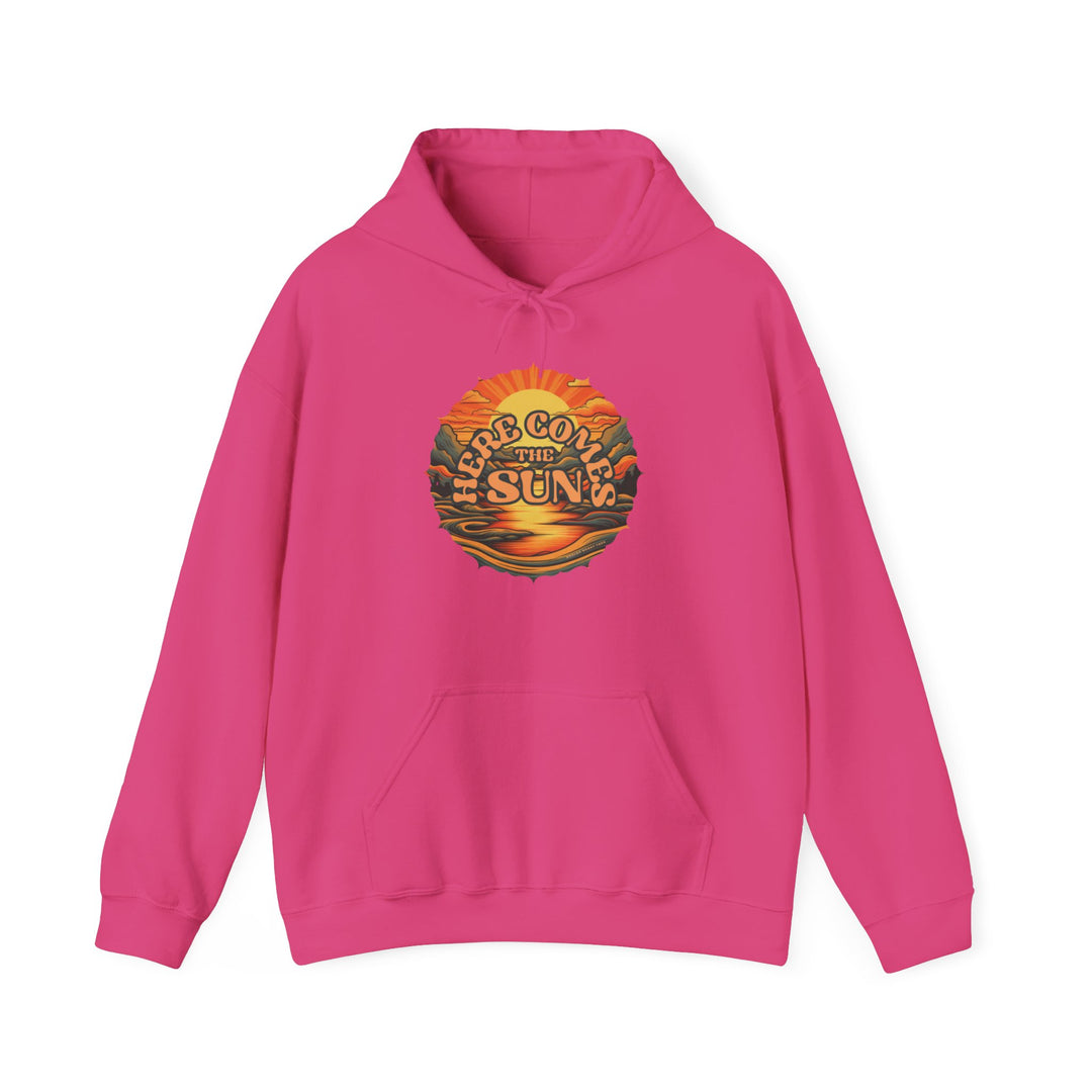 A pink unisex heavy blend hooded sweatshirt featuring the Here Comes the Sun logo. Made of 50% cotton and 50% polyester, with a kangaroo pocket and drawstring hood. Medium-heavy fabric, tear-away label, classic fit.