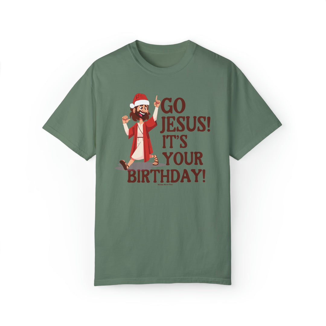 A green tee featuring a cartoon man in a Santa hat, embodying festive humor. Unisex and comfy, made of 80% ring-spun cotton and 20% polyester, with a relaxed fit and rolled-forward shoulder. From 'Worlds Worst Tees'.