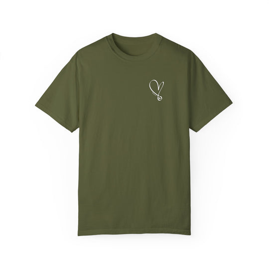 A green tee featuring a heart and stethoscope design, the I am Beautiful Tee. Made of 100% ring-spun cotton, garment-dyed for coziness, with a relaxed fit and durable double-needle stitching.