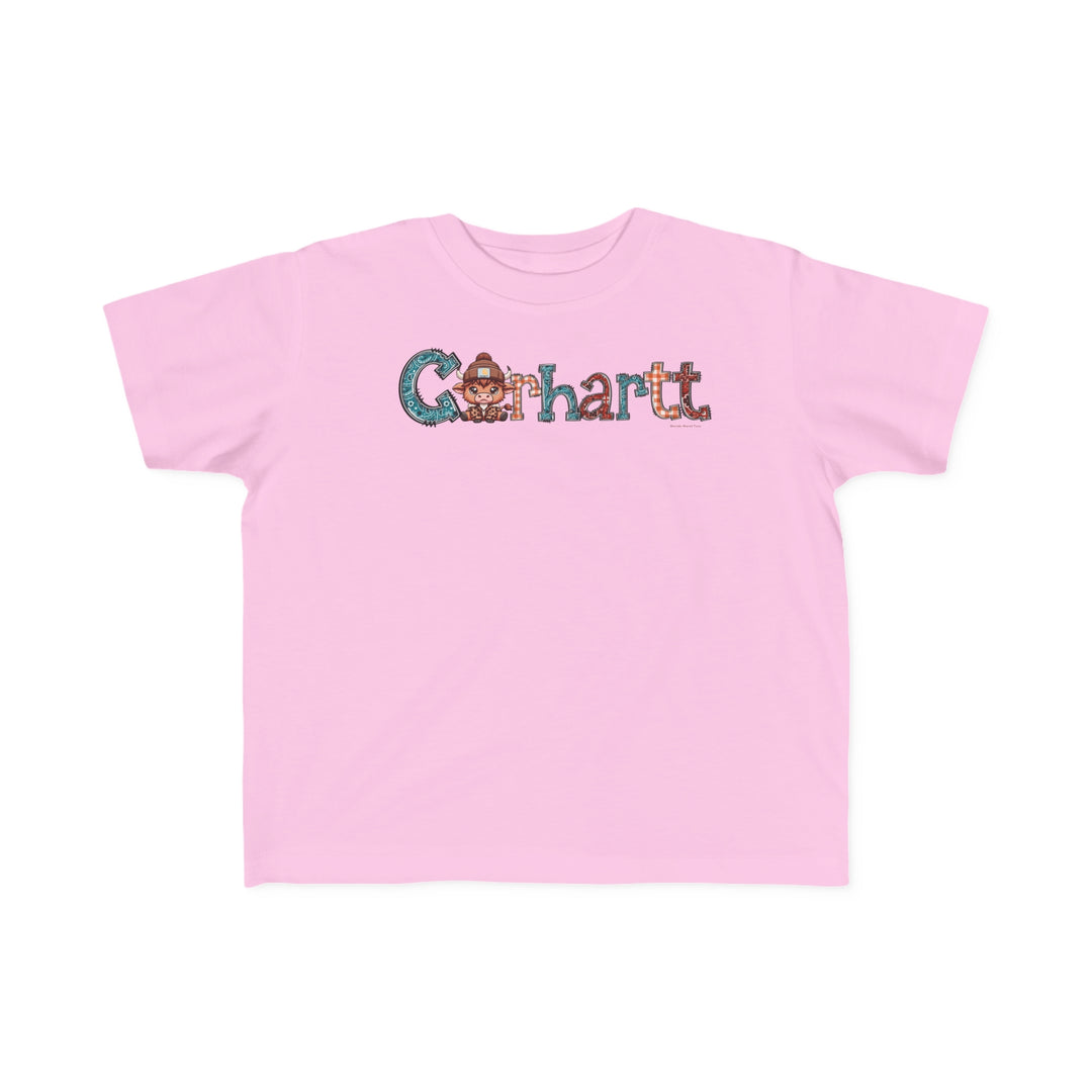 Cowhartt Toddler Tee featuring a cartoon cow and hat print on a pink shirt. Soft 100% combed ringspun cotton, tear-away label, classic fit, perfect for sensitive skin. Sizes: 2T, 3T, 4T, 5-6T.