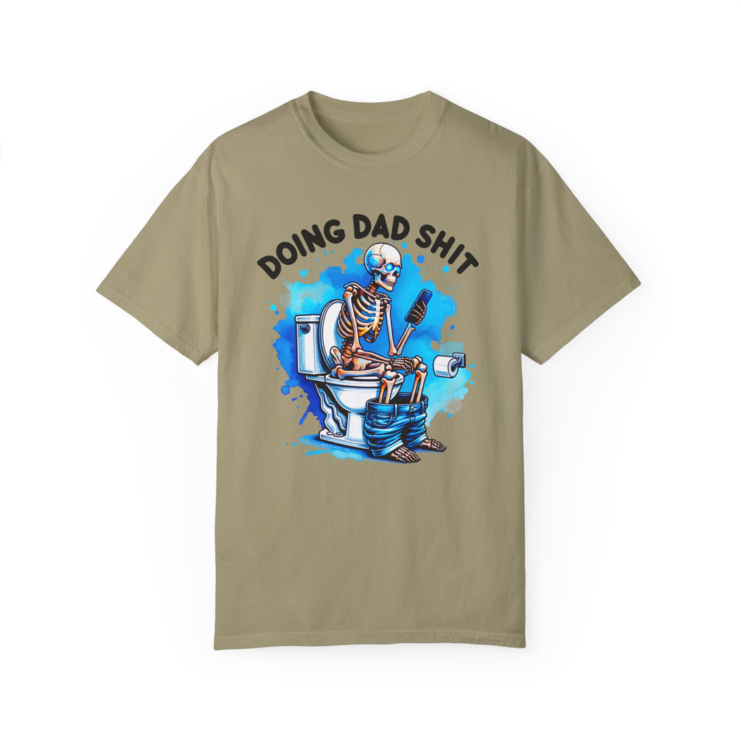 A relaxed fit, garment-dyed Doing Dad Shit Tee on a t-shirt with a skeleton design. Made of 100% ring-spun cotton for comfort and durability. Ideal for daily wear from Worlds Worst Tees.