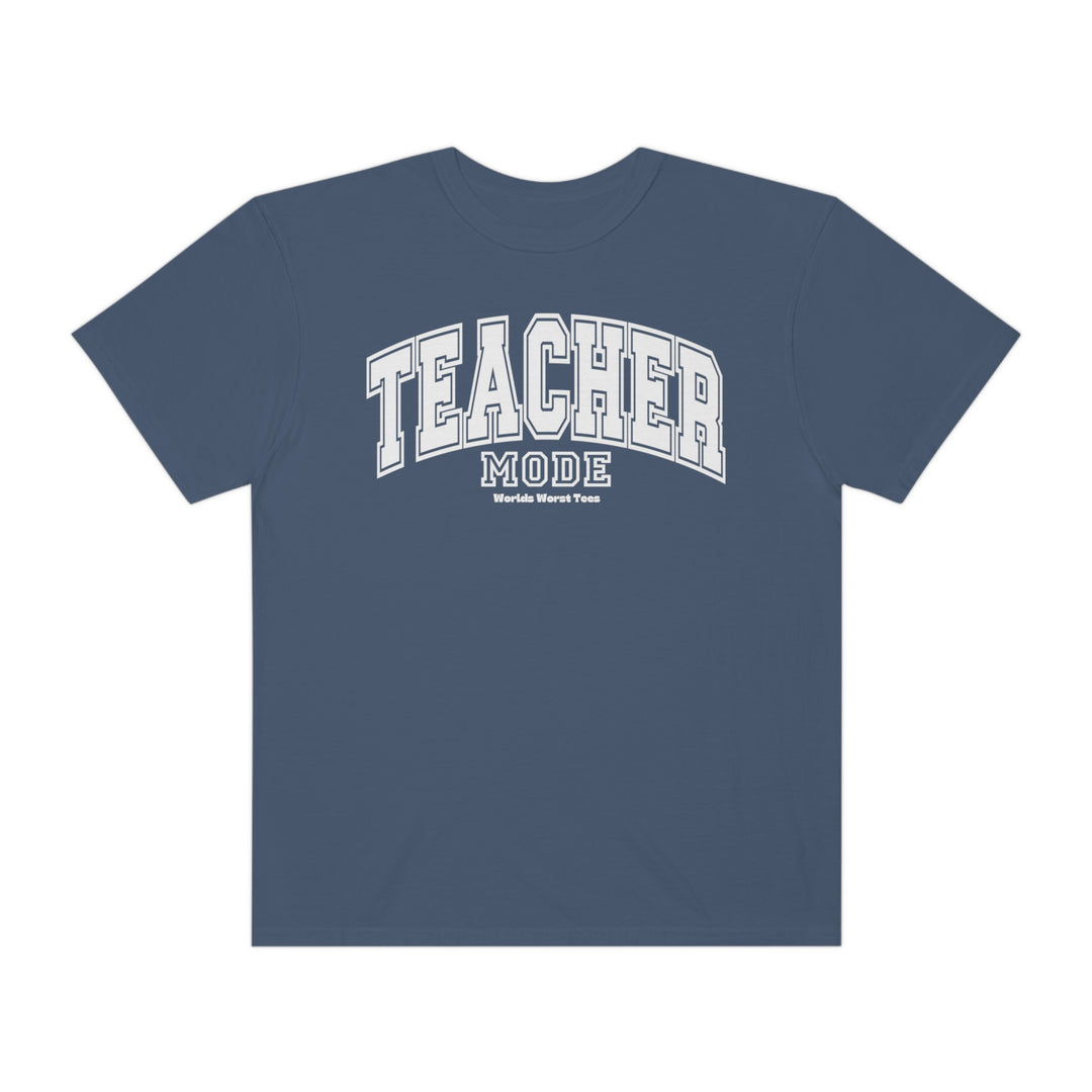 Unisex Teacher Mode Tee, a blue shirt with white text, crafted from 80% ring-spun cotton and 20% polyester. Features a relaxed fit, rolled-forward shoulder, and back neck patch. Sizes range from S to 4XL.