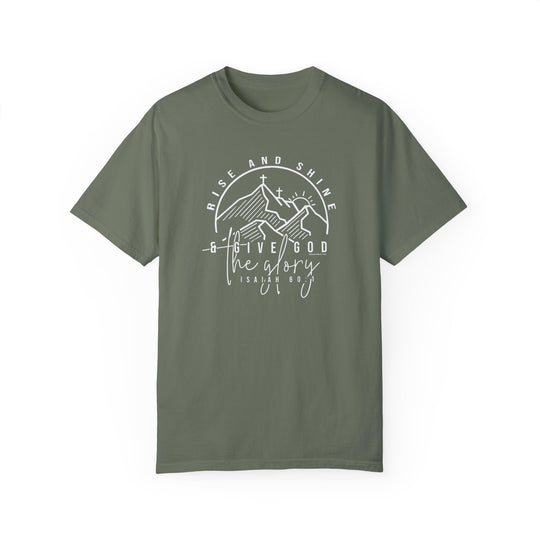 A relaxed fit Rise and Shine Tee, crafted from 100% ring-spun cotton with double-needle stitching for durability. Soft-washed and garment-dyed for coziness, featuring a graphic design on a green background.