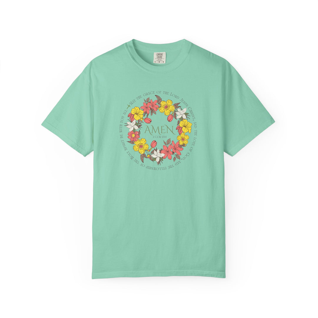 Amen Tee: Green t-shirt featuring a floral design, crafted from soft, garment-dyed cotton, offering a relaxed fit and durable, seamless construction for everyday wear.
