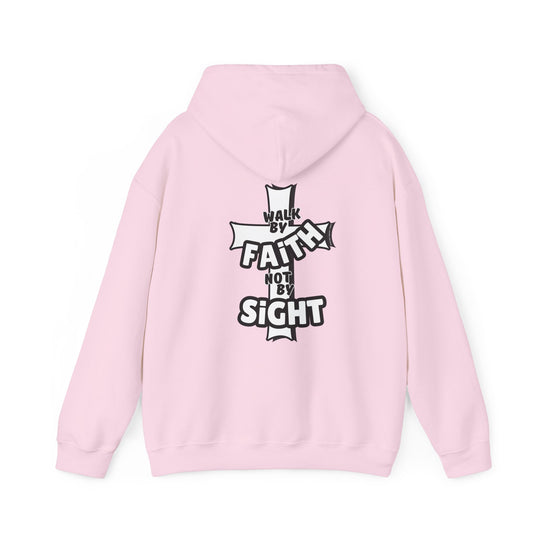 A pink hoodie featuring a cross design and text, part of the Walk By Faith Not By Sight Crew collection by Worlds Worst Tees. Unisex heavy blend sweatshirt with kangaroo pocket, cotton-polyester fabric, and classic fit.