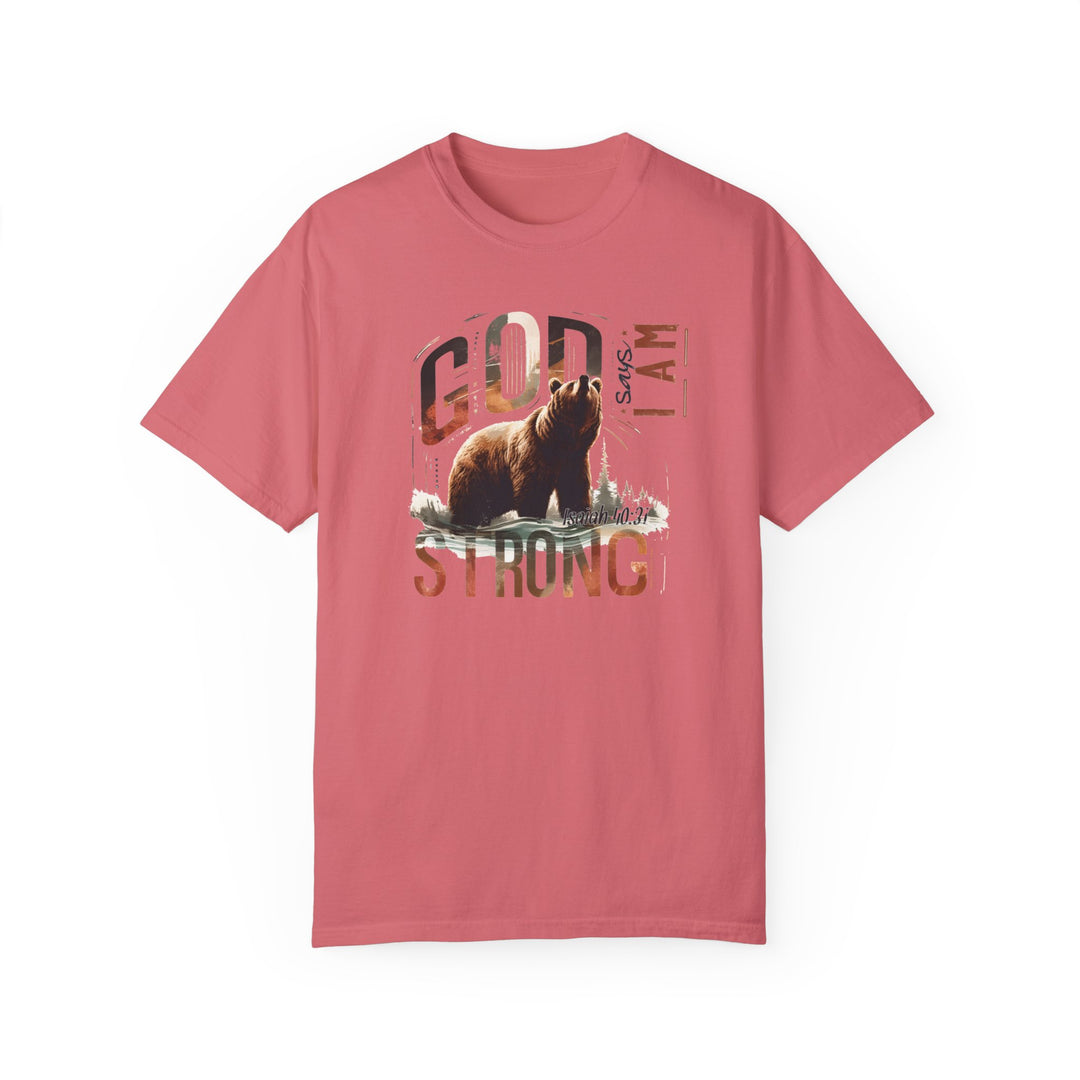 A pink t-shirt featuring a bear design, the I Am Strong Tee from Worlds Worst Tees. Made of 100% ring-spun cotton, garment-dyed for softness, with a relaxed fit and durable double-needle stitching.