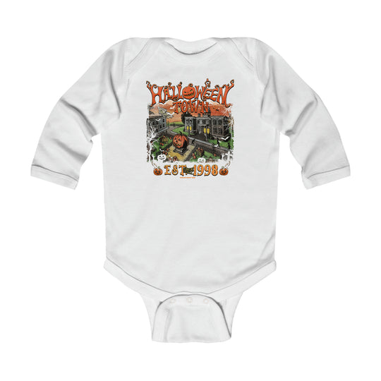 A white baby bodysuit featuring a train design, perfect for infants. Made of soft cotton, with ribbed knitting for durability and easy plastic snaps for changing. From Worlds Worst Tees.