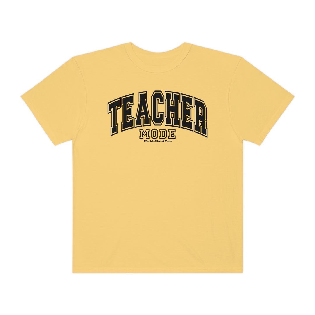 A relaxed fit Teacher Mode Tee in yellow with black text, made of 80% ring-spun cotton and 20% polyester. Unisex garment-dyed sweatshirt with rolled-forward shoulder and medium-heavy fabric.