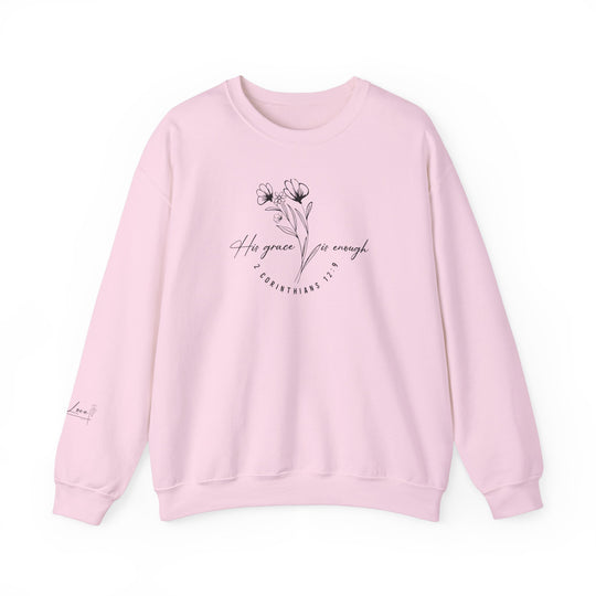 A pink sweatshirt with a flower design, His Grace Is Enough Crew, a cozy unisex heavy blend crewneck sweatshirt made of 50% cotton and 50% polyester. Features ribbed knit collar and double-needle stitching for durability.