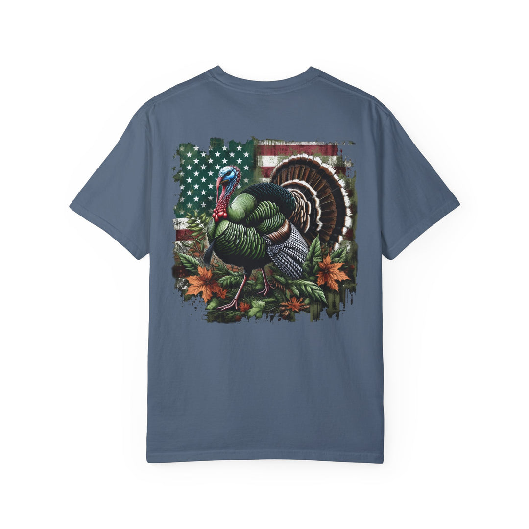 A relaxed-fit Turkey Hunting Tee in 100% ring-spun cotton, featuring a colorful turkey design. Garment-dyed for extra coziness, with double-needle stitching for durability and a seamless finish.