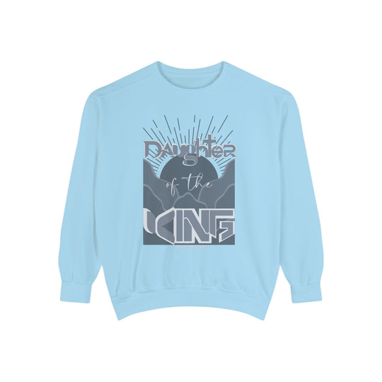 Daughter of the King Crew unisex sweatshirt, blue with graphic design. 80% ring-spun cotton, 20% polyester, relaxed fit, rolled-forward shoulder, back neck patch. Sizes S to 2XL.