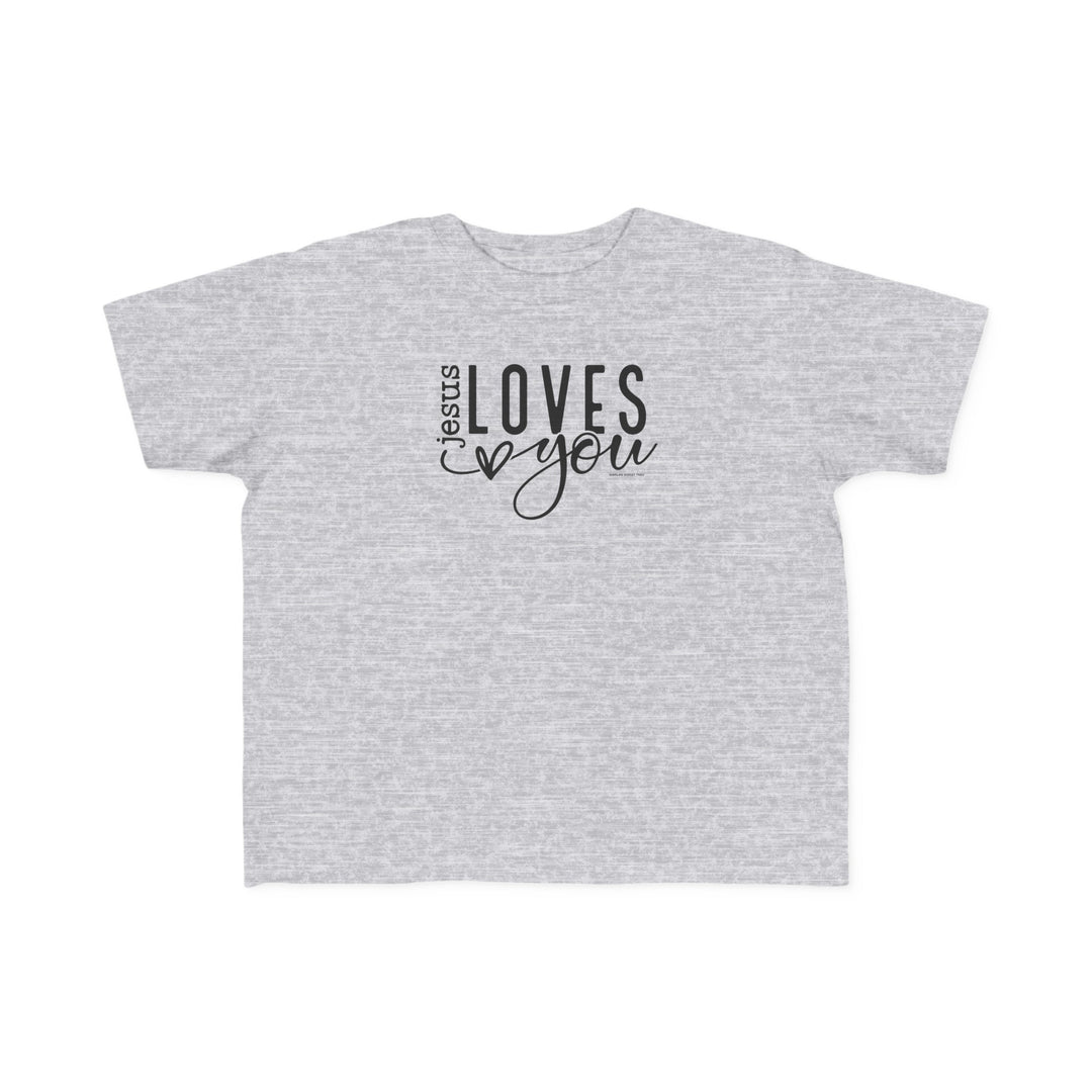 Toddler tee with Jesus Loves You text, ideal for sensitive skin. Soft 100% combed ringspun cotton, light fabric, classic fit. Sizes: 2T, 3T, 4T, 5-6T. Durable print for first ventures.