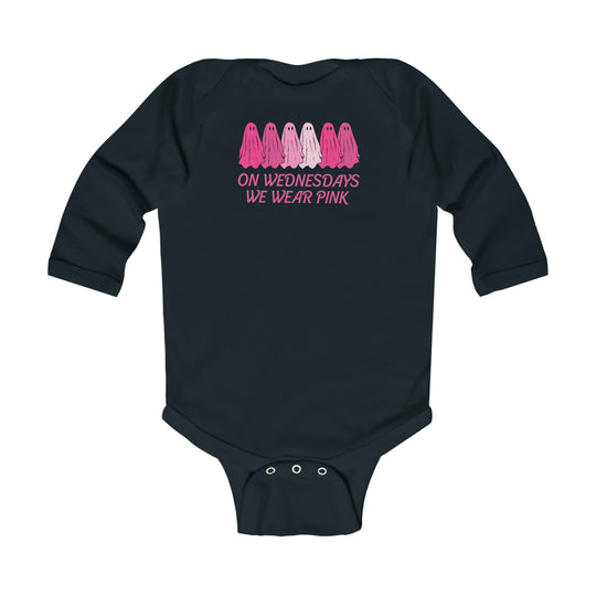 Black baby bodysuit with pink text, featuring On Wednesday's We Wear Pink design. Soft 100% combed ring-spun cotton, ribbed bindings, and plastic snaps for easy changing. From Worlds Worst Tees.