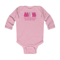 A pink baby bodysuit featuring words, designed for durability and comfort. Made of 100% cotton with plastic snaps for easy changing. From 'Worlds Worst Tees'.