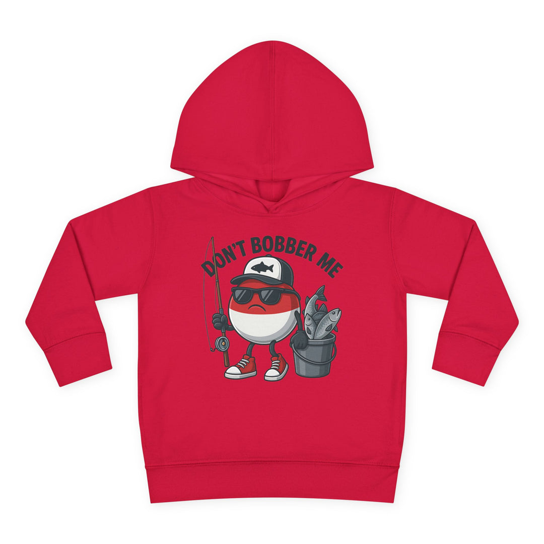 Don't Bobber Me Toddler Hoodie featuring a cartoon fishing-bobber character with sunglasses and cap, holding fishing gear, ideal for cozy, durable wear.
