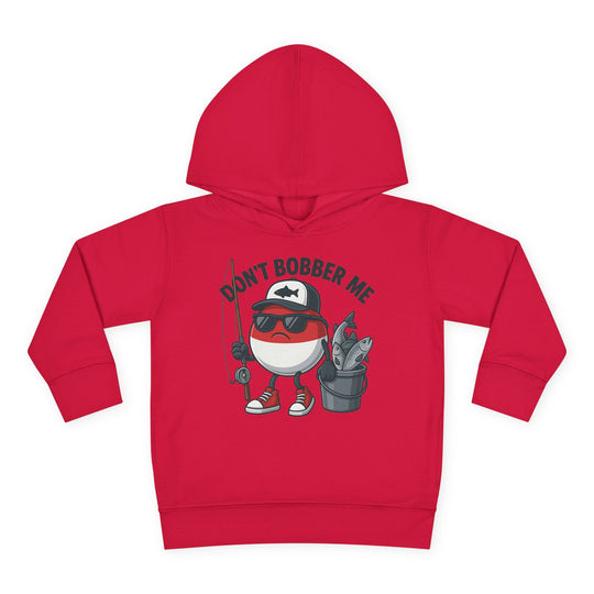 Don't Bobber Me Toddler Hoodie featuring a cartoon fishing-bobber character with sunglasses and cap, holding fishing gear, ideal for cozy, durable wear.