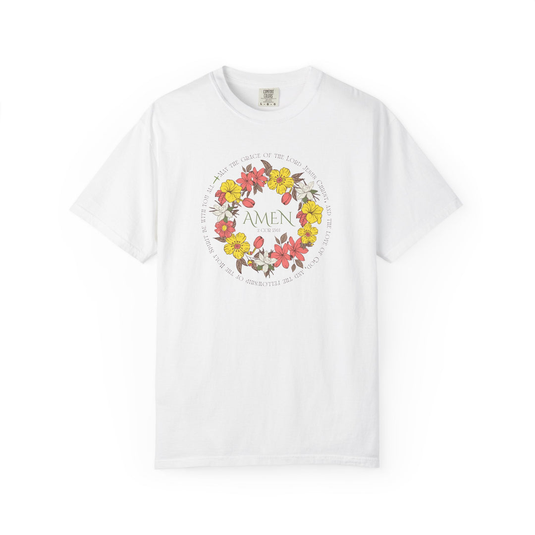 Amen Tee: A white t-shirt featuring a floral design, made from 100% ring-spun cotton, offering a relaxed fit and durable construction for everyday wear.