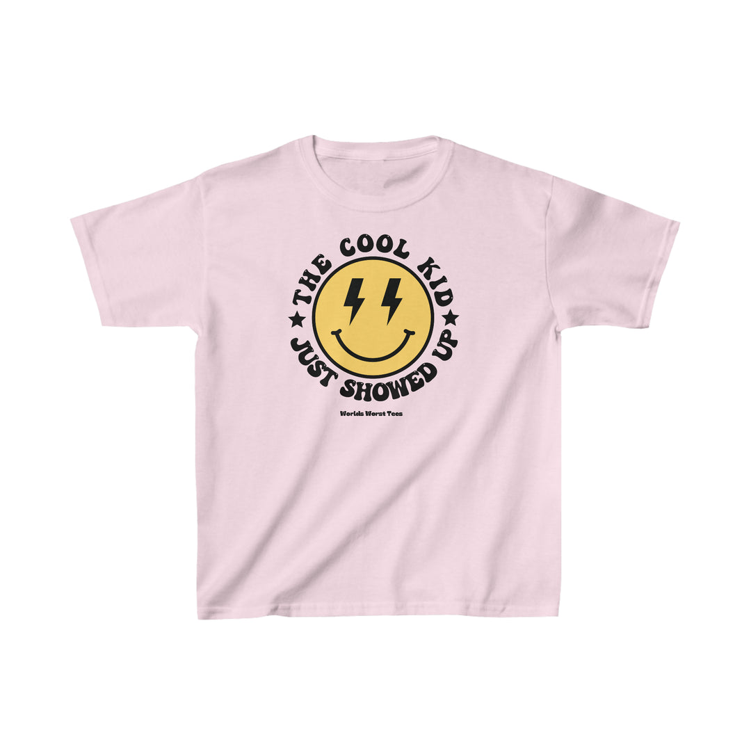 A kids' heavy cotton tee, The Cool Kid Just Showed Up, in white with a yellow logo. 100% cotton, light fabric, classic fit, tear-away label. Ideal for everyday wear.
