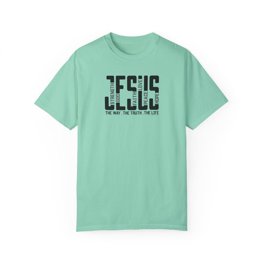 A Jesus Tee in green with black text, a cozy ring-spun cotton garment-dyed shirt from Worlds Worst Tees. Relaxed fit, double-needle stitching, no side-seams for durability and comfort.