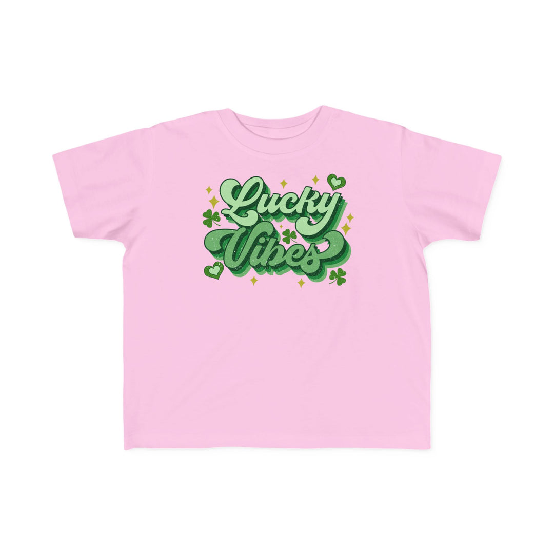 Good Day Lucky Day Toddler's Tee, featuring a playful green text design on a soft pink t-shirt, perfect for toddlers' comfort and style.