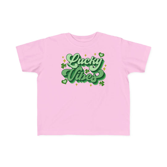 Good Day Lucky Day Toddler's Tee, featuring a playful green text design on a soft pink t-shirt, perfect for toddlers' comfort and style.