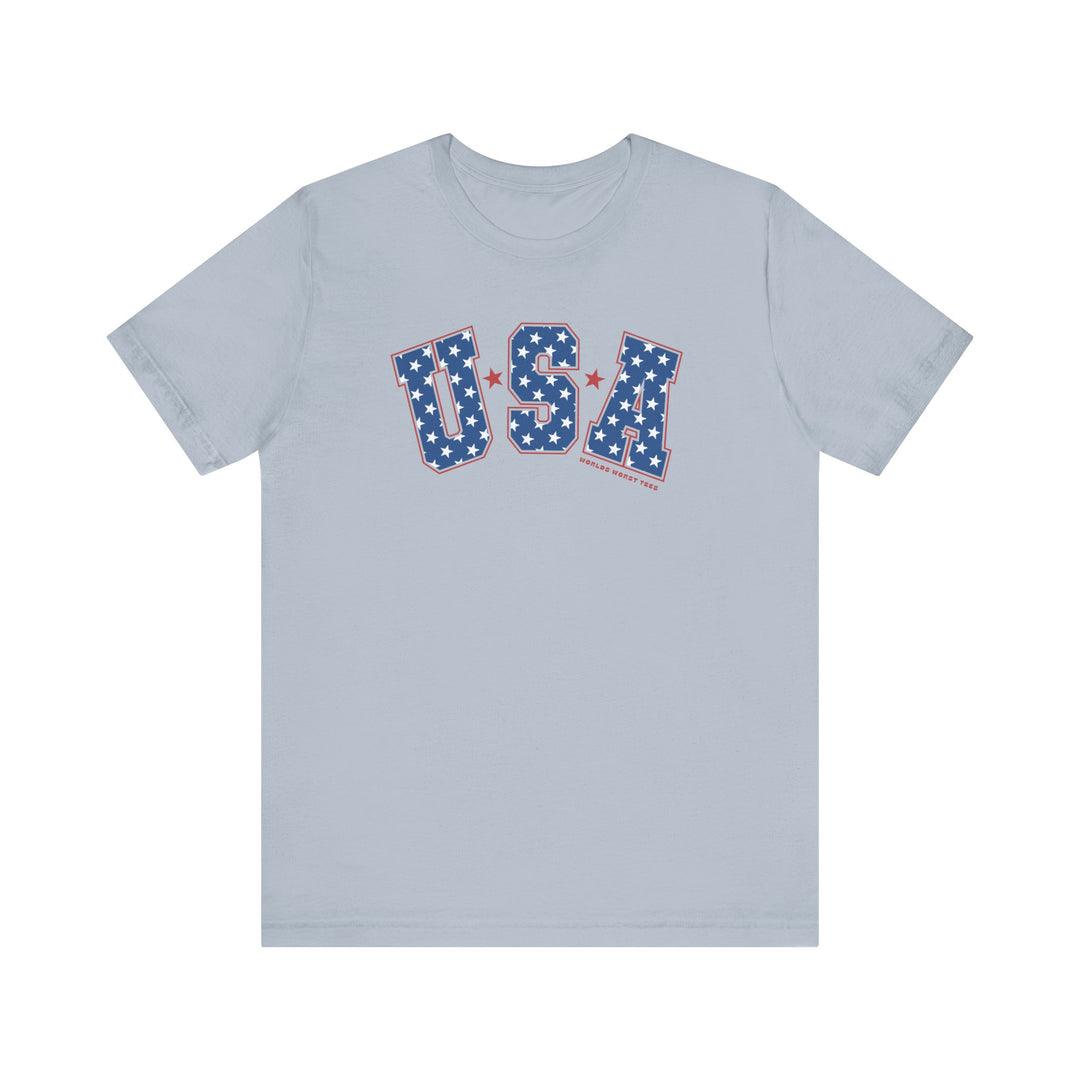 A classic USA Tee in grey with red and blue stars and stripes, made of 100% cotton. Features ribbed knit collars, taping on shoulders, and dual side seams for durability. Sizes XS to 3XL.