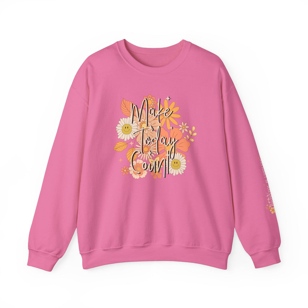 A pink sweatshirt with floral design, the Make Today Count Crew, a comfy unisex blend of polyester and cotton. Ribbed knit collar, no itchy seams, loose fit, medium-heavy fabric. Ideal for all occasions.