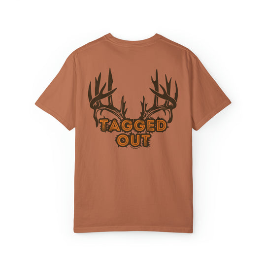 A brown t-shirt featuring antlers and text, embodying comfort and style. Unisex garment-dyed sweatshirt made of 80% ring-spun cotton and 20% polyester, with a relaxed fit and rolled-forward shoulder.