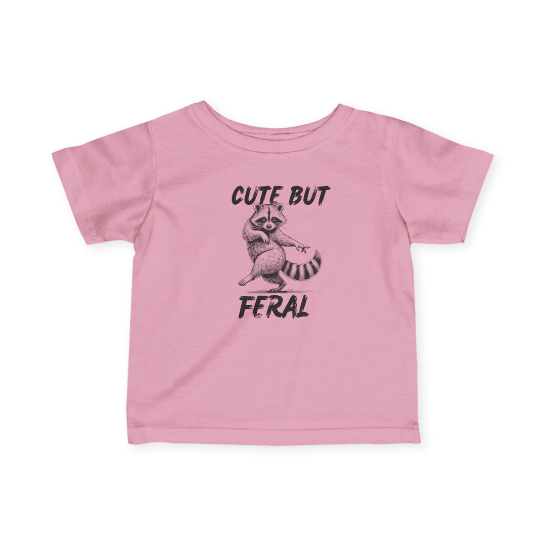 Cute but Feral Baby Tee: Light-pink children's T-shirt with a raccoon sketch and CUTE BUT FERAL text, designed for comfort and durability with ribbed knitting.