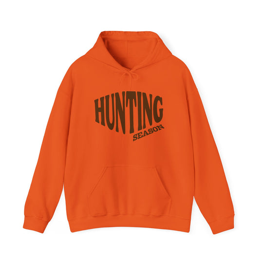 Bright orange Hunting Season hoodie with kangaroo pocket and drawstring hood, featuring bold black lettering on chest. Cozy, unisex fit for casual, stylish warmth.