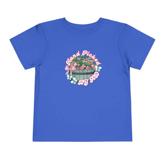 Hand Picked by GOD Toddler Tee, a short sleeve Bella Canvas shirt, crafted from soft 100% Airlume cotton for comfort, featuring a tear-away label for toddlers.