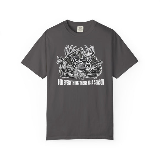 Charcoal-gray tee featuring wildlife collage with stag, bobcat, duck, fish, and slogan “FOR EVERYTHING THERE IS A SEASON,” highlighting unique graphic design.