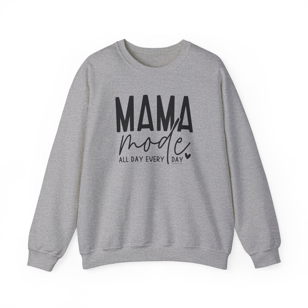 A Mama Mode Crew unisex heavy blend sweatshirt in grey with black text. Features ribbed knit collar, no itchy side seams, 50% cotton, 50% polyester, loose fit, and medium-heavy fabric.