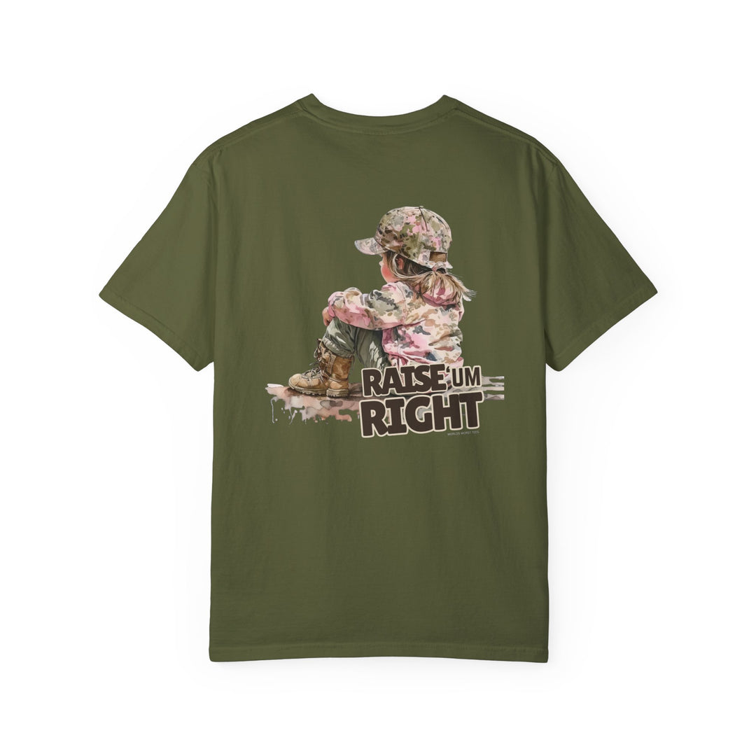 Child's green camo shirt with a playful design featuring a child on it. Ring-spun cotton tee, garment-dyed for extra softness and durability. Relaxed fit, medium weight, no side-seams for comfort.