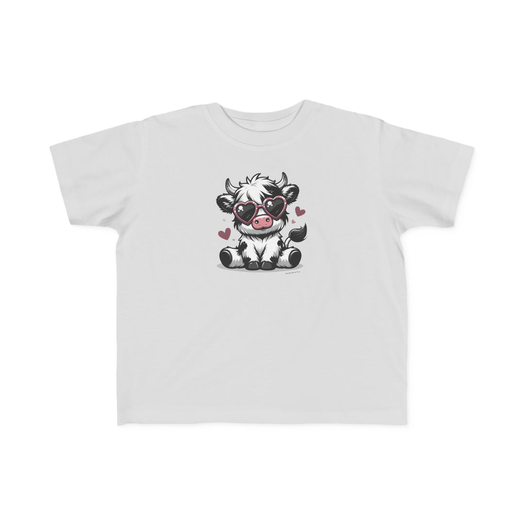 Cute Cow Toddler Tee: White t-shirt featuring a cartoon cow in sunglasses. Soft 100% combed ringspun cotton, tear-away label, classic fit. Perfect for sensitive skin, durable print. Sizes: 2T, 3T, 4T, 5-6T.