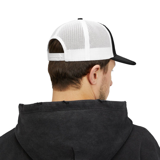 Girl Dad Snapback Trucker Cap (Embroidery) on a man's head, showcasing its structured fit, pre-curved visor, and mesh back for a casual, breathable style.