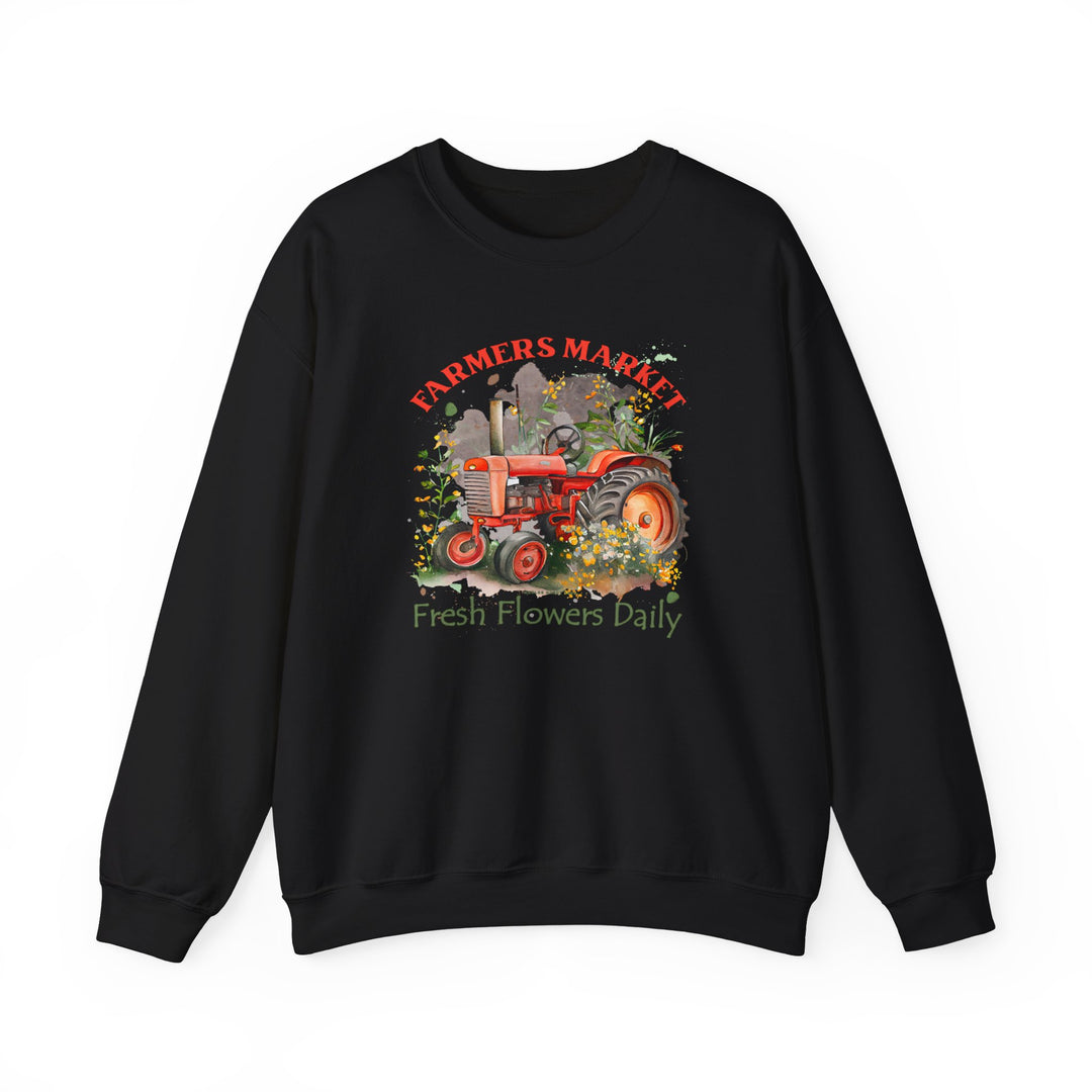 A black crewneck sweatshirt featuring a tractor design, ideal for comfort in any situation. Unisex, medium-heavy fabric blend of 50% cotton and 50% polyester. Ribbed knit collar, no itchy side seams, true to size fit.