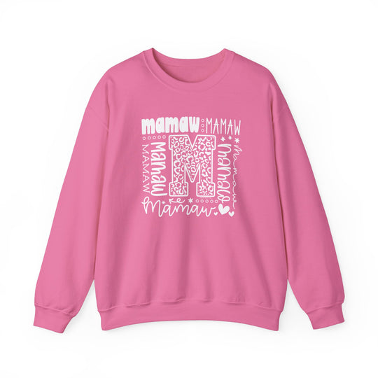A cozy Mamaw Crew unisex sweatshirt in pink with white letters, made of 50% cotton and 50% polyester blend. Ribbed knit collar, classic fit, and durable double-needle stitching for comfort and style.