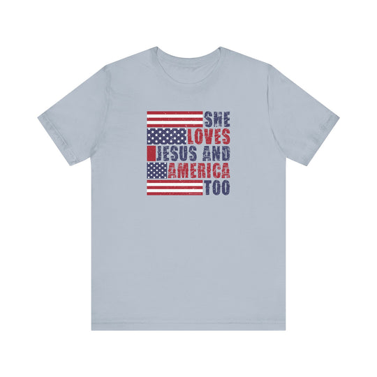 A She Loves Jesus and America Tee: Unisex jersey shirt with flag and text. 100% cotton, light fabric, retail fit. Ribbed knit collars, tear away label, true to size.