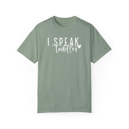 A cozy I Speak Toddler Tee in green with white text. 100% ring-spun cotton, garment-dyed, relaxed fit, and durable double-needle stitching. From Worlds Worst Tees.