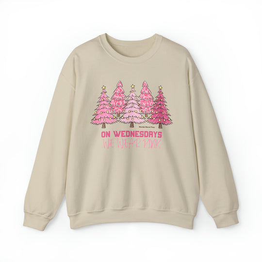 Unisex heavy blend crewneck sweatshirt featuring On Wednesdays we wear pink Christmas Crew design. Comfortable, loose fit with ribbed knit collar. 50% cotton, 50% polyester, medium-heavy fabric. Sewn-in label.