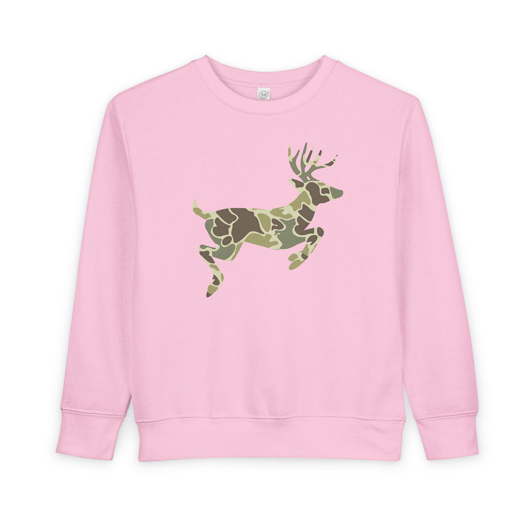 Light-pink toddler crewneck sweatshirt featuring a leaping deer silhouette with a green/brown camouflage pattern, blending comfort and style in a soft cotton-polyester fleece.