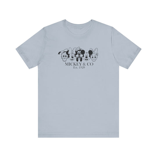 Mickey and CO Tee, a classic unisex jersey short sleeve shirt, features soft cotton with ribbed knit collars and tapered shoulders for a comfortable, enduring fit.