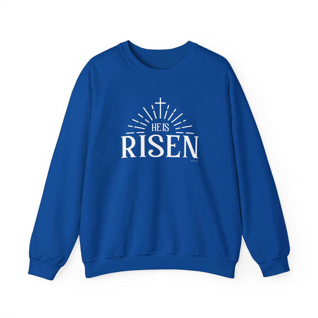 Unisex He is Risen Crew sweatshirt, medium-heavy 50% cotton, 50% polyester fabric blend. Classic fit, ribbed knit collar, double-needle stitching for durability. Ethically made with tear-away label.