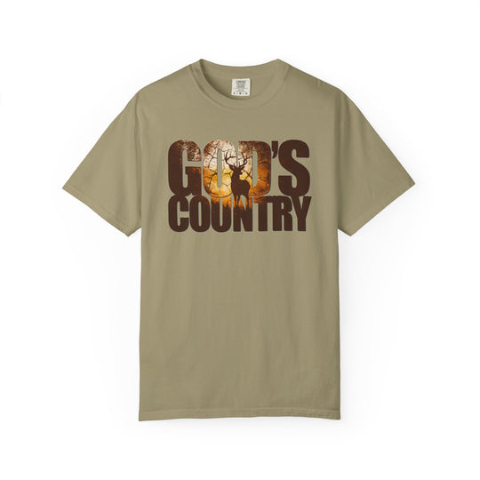 God's Country Tee: Khaki-green, short-sleeve shirt with GOD'S COUNTRY graphic featuring a rustic woods scene and buck silhouette. Comfortable, durable, relaxed fit.