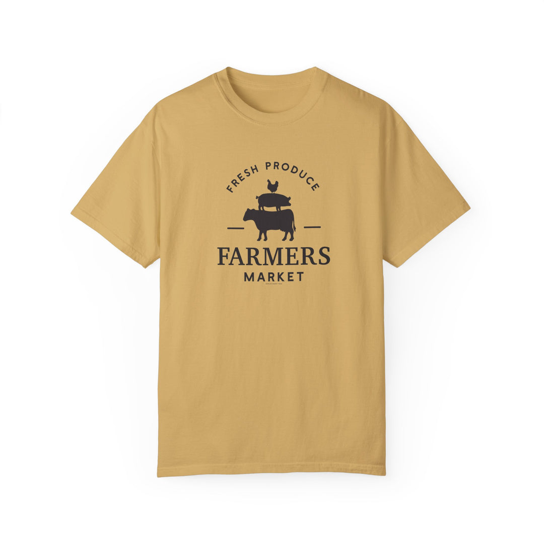 A tan Farmers Market Tee, 100% ring-spun cotton, garment-dyed for extra coziness. Relaxed fit, double-needle stitching for durability, tubular shape. Medium weight, no side-seams, ideal for daily wear.