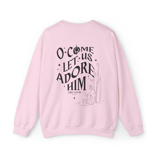 Unisex heavy blend crewneck sweatshirt featuring O come let us adore him Crew design. Medium-heavy fabric, ribbed knit collar, loose fit, sewn-in label. Comfortable and stylish.