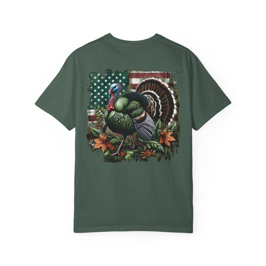 A ring-spun cotton Turkey Hunting Tee in green with a detailed turkey design. Garment-dyed for extra coziness, featuring a relaxed fit and durable double-needle stitching. From Worlds Worst Tees.