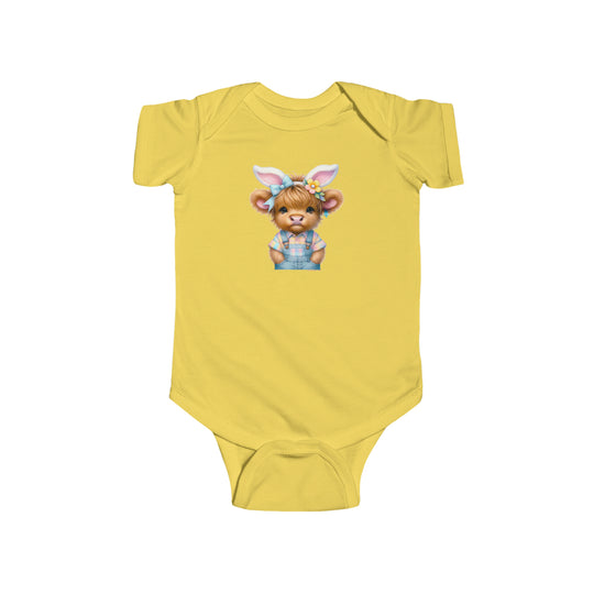 A yellow baby bodysuit featuring a cartoon cow with bunny ears, perfect for Easter fun. Made of 100% cotton, with ribbed knitting for durability and plastic snaps for easy changing. From Worlds Worst Tees.