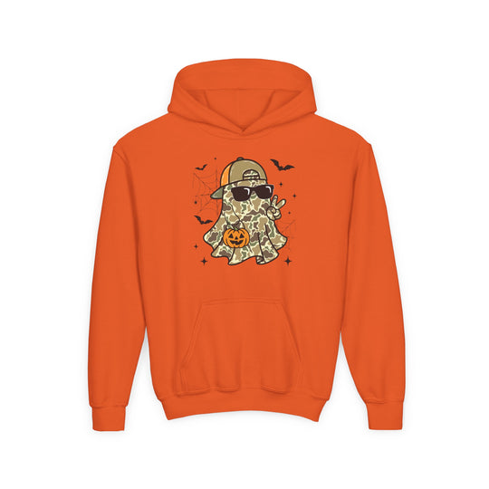 Candy Ghost Youth Hoodie features a camo-patterned ghost with sunglasses, peace sign, and pumpkin bucket, accented by bats and spiderwebs, on an ultra-soft fleece.